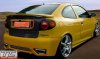 Renault Megane (1995 - 2002)<br>Renault MEGANE COUPE phase 1/2 - tylny zderzak z 2 koncówkami wydechu/ rear bumper incl. 2 pipe