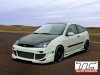 Ford Focus (1998 - 2004)<br>Ford FOCUS Mk.1 - przedni zderzak / front bumper - FOFO-12